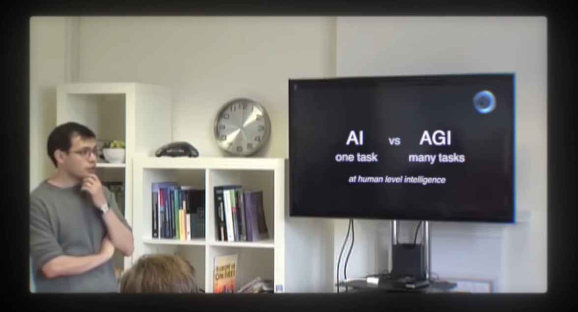 Demis Hassabis presenting AI vs AGI: AI is one task, AGI is many tasks, both at human level intelligence